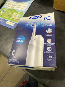 Oral-B iO Simple Clean Rechargeable Electric Powered Toothbrush, Pure White with 1 Gentle Care Brush Head and 1 White Travel Case - Automatic Pressure Sensor to Protect Gums - 3 Modes -2 Min Timer photo 2