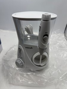 Waterpik Aquarius Water Flosser For Teeth Cleaning, Gums, Braces, Dental Care, Electric Power With 10 Settings, 7 Tips For Multiple Users And Needs, ADA Accepted, White WP-660, Packaging May Vary photo 4